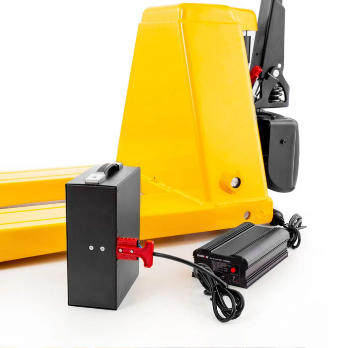 Battery charger connected to a black battery box with a red clamp, set next to a yellow forklift mast, ready to charge the forklift battery.