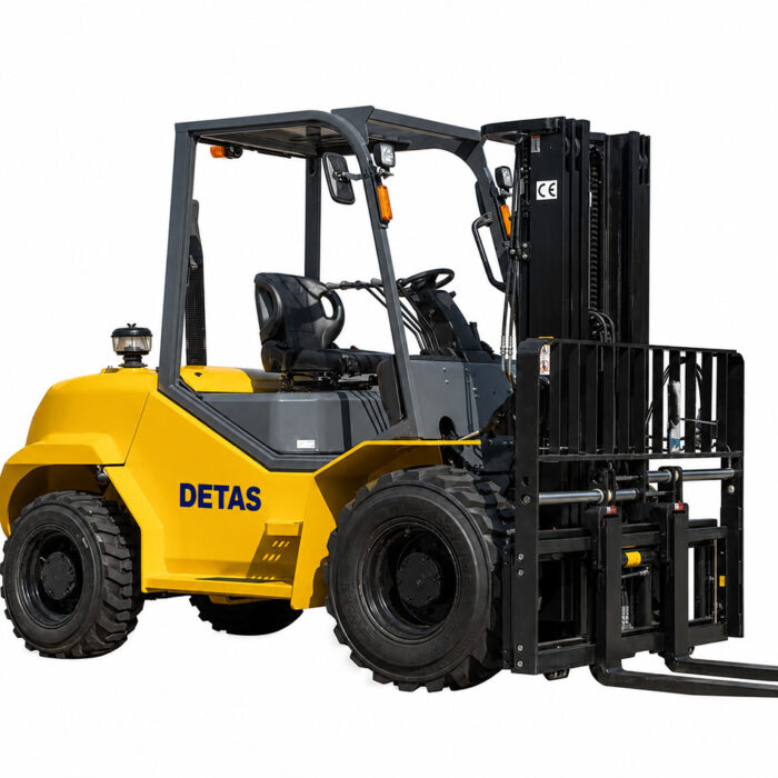 Yellow forklift truck with black mast and forks, labeled DETAS, used for lifting pallets in warehouses