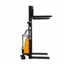 Electric pallet stacker with a yellow motor housing and black frame, side view, forks extended for lifting pallets.