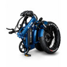Blue folding electric bike in a compact folded pose, showing thick knobby tires and blue frame with 'icone' branding.