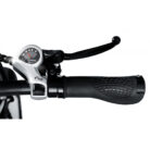 Close-up of a bicycle handlebar: Shimano 6-speed trigger shifter beside a textured black grip and brake lever.