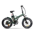 Folding electric mountain bike with wide fat tires, green frame, black saddle, and front suspension viewed from the side.