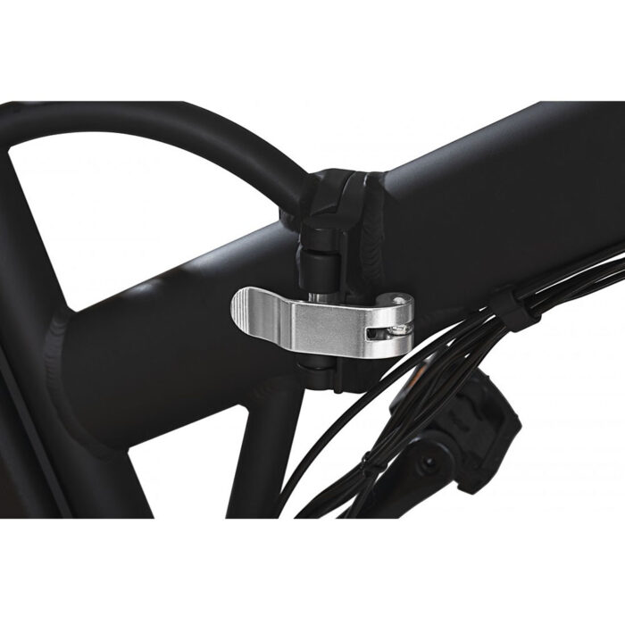 Close-up of a silver clamp on a black bicycle frame, used to attach an accessory